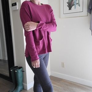 soft fuchsia sweater with pockets about size medium